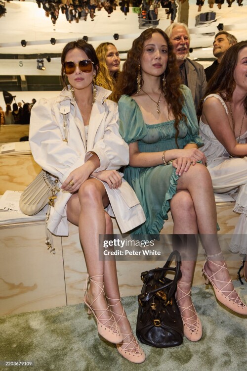 PARIS, FRANCE - MARCH 06: (EDITOR'S NOTE: Image contains nudity. EDITORIAL USE ONLY - For Non-Editorial use please seek approval from Fashion House) (L-R) Zoey Deutch and Laufey attend the Chloe Womenswear Fall/Winter 2025-2026 show as part of Paris Fashion Week  at Tennis Club de Paris on March 06, 2025 in Paris, France. (Photo by Peter White/Getty Images)