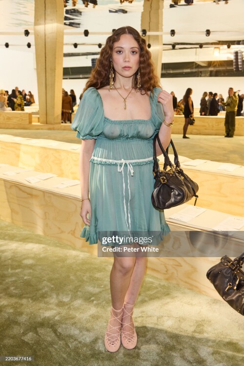 PARIS, FRANCE - MARCH 06: (EDITOR'S NOTE: Image contains partial nudity. EDITORIAL USE ONLY - For Non-Editorial use please seek approval from Fashion House) Laufey attends the Chloe Womenswear Fall/Winter 2025-2026 show as part of Paris Fashion Week  at Tennis Club de Paris on March 06, 2025 in Paris, France. (Photo by Peter White/Getty Images)
