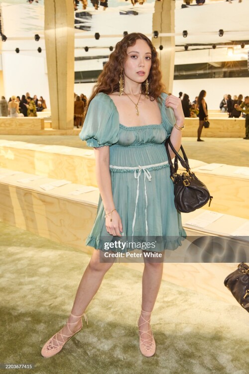 PARIS, FRANCE - MARCH 06: (EDITOR'S NOTE: Image contains partial nudity. EDITORIAL USE ONLY - For Non-Editorial use please seek approval from Fashion House) Laufey attends the Chloe Womenswear Fall/Winter 2025-2026 show as part of Paris Fashion Week  at Tennis Club de Paris on March 06, 2025 in Paris, France. (Photo by Peter White/Getty Images)