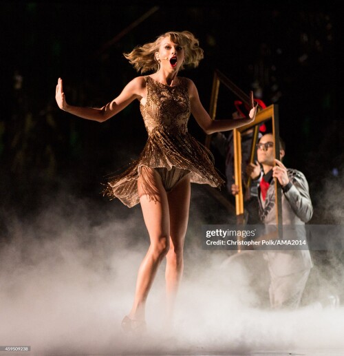 LOS ANGELES, CA - NOVEMBER 23:  Recording artist Taylor Swift performs onstage at the 2014 American Music Awards at Nokia Theatre L.A. Live on November 23, 2014 in Los Angeles, California.  (Photo by Christopher Polk/AMA2014/Getty Images for DCP)