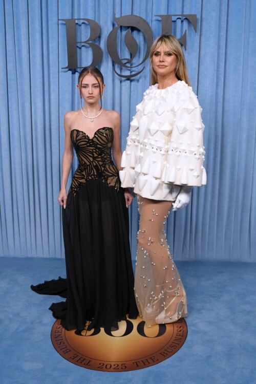 Leni Olumi Klum, left, and Heidi Klum pose for photographers upon arrival at the BoF 500 gala in Paris, Saturday, Oct. 4, 2025. (AP Photo/Aurelien Morissard)