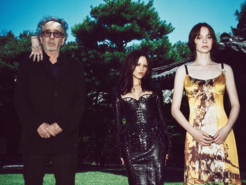 (L to R) Thing, Tim Burton, Jenna Ortega, Emma Myers