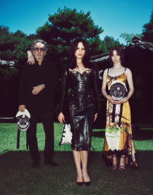 (L to R) Thing, Tim Burton, Jenna Ortega, Emma Myers