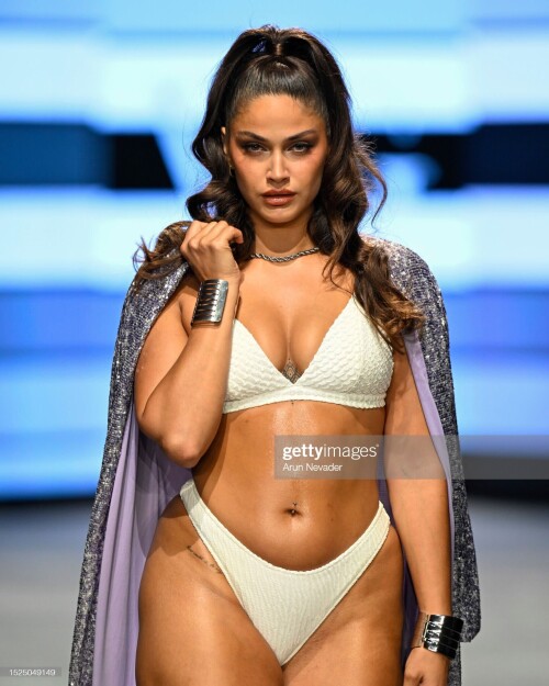 MIAMI BEACH, FLORIDA - JULY 07: A model walks the runway wearing Willfredo Gerardo during Miami Swim Week Powered by Art Hearts Fashion at Fontainebleau Hotel on July 07, 2023 in Miami Beach, Florida. (Photo by Arun Nevader/Getty Images for Art Hearts Fashion)