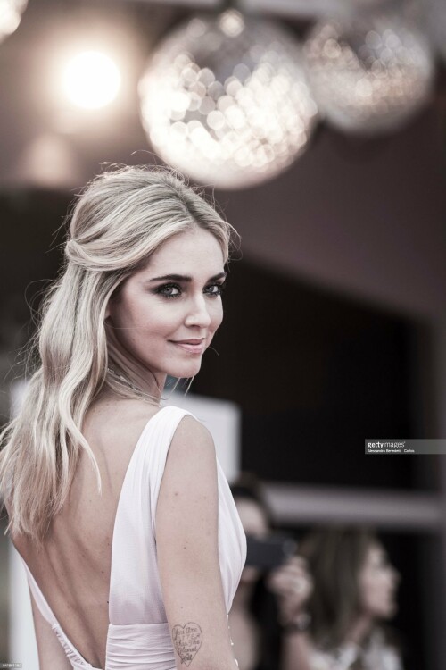 VENICE, ITALY - SEPTEMBER 02: (EDITORS NOTE: Image has been desaturated.) Chiara Ferragni walks the red carpet ahead of the 'Suburbicon' screening during the 74th Venice Film Festival at Sala Grande on September 2, 2017 in Venice, Italy. (Photo by Alessandra Benedetti - Corbis/Corbis via Getty Images)