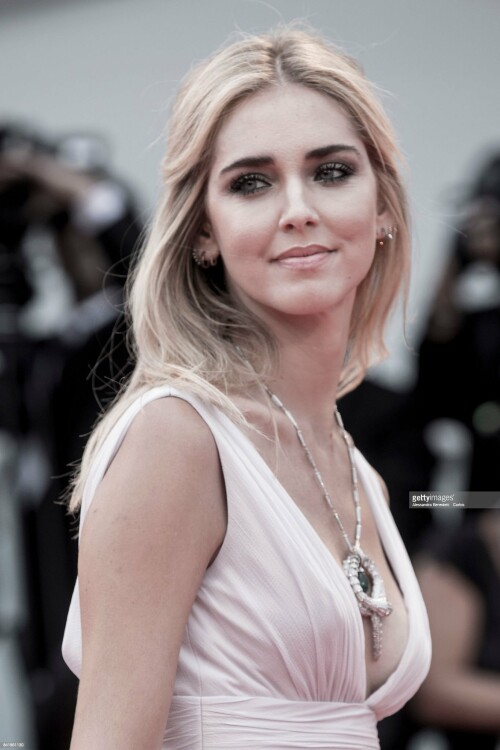 VENICE, ITALY - SEPTEMBER 02: (EDITORS NOTE: Image has been desaturated.) Chiara Ferragni walks the red carpet ahead of the 'Suburbicon' screening during the 74th Venice Film Festival at Sala Grande on September 2, 2017 in Venice, Italy. (Photo by Alessandra Benedetti - Corbis/Corbis via Getty Images)
