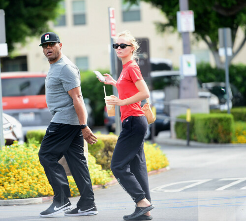 09/10/2022 EXCLUSIVE: Lily-Rose Depp heads to Starbucks with a bodyguard in Los Angeles. The  23 year old actress wore a red t-shirt, Champion joggers, and slip on shoes. sales@theimagedirect.com Please byline:TheImageDirect.com*EXCLUSIVE PLEASE EMAIL sales@theimagedirect.com FOR FEES BEFORE USE