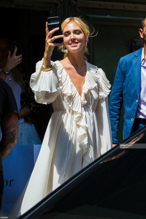 NOTO, ITALY - AUGUST 30: Chiara Ferragni, in a white dress, is seen outside Palazzo Nicolaci di Villadorata on August 30, 2018 in Noto, Italy. (Photo by Claudio Lavenia/GC Images)