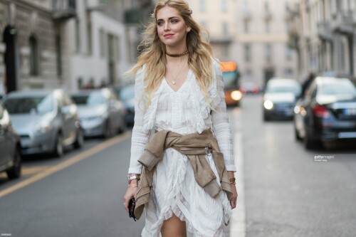 MILAN, ITALY - FEBRUARY 22: Chiara Ferragni wearing a white dress outside Alberta Ferretti on February 22, 2017 in Milan, Italy. (Photo by Christian Vierig/Getty Images)