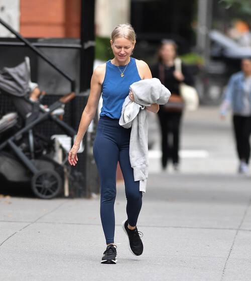 3 October 2024 - EXCLUSIVE.Naomi Watts meets up with a friend in New York City. The 56 year old actress wore a blue tank top, matching leggings, and black trainers.Credit: GoffPhotos.com   Ref: KGC-339/TIDNY-252**UK Sales Only - No Daily Mail Group/No Sun Group - Exclusive - Newspapers Allrounder - Magazines Double Space Rates - Web/Online Must Call Before Use**