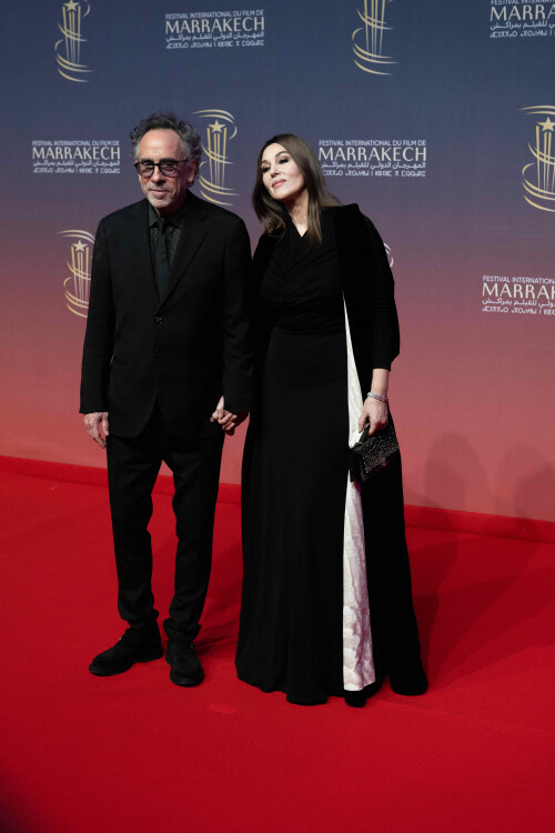MARRAKECH, MOROCCO - NOVEMBER 29: Monica Bellucci and Tim Burton attend the Opening Ceremony during the 21st Marrakech International Film Festival on November 29, 2024 in Marrakech, Morocco. Abu Adem Muhammed / Anadolu/ABACAPRESS.COM