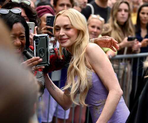 Lindsay Lohan at Freaky Friday premier Pictured: Ref: BLU_S8452048 310725 NON-EXCLUSIVEPicture by: Timmie / SplashNews.comSplash News and PicturesUSA: 310-525-5808 UK: 020 8126 1009eamteam@shutterstock.comWorld Rights