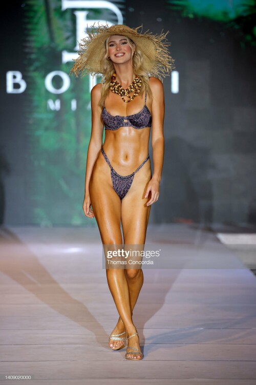 MIAMI BEACH, FLORIDA - JULY 15: A model walks the runway for Bodhi Miami during DC Miami Swim Week: The Shows powered by DCSW at SLS South Beach on July 15, 2022 in Miami Beach, Florida. (Photo by Thomas Concordia/Getty Images for DC Miami Swim Week)