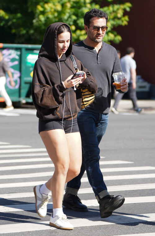 26 May 2023 - EXCLUSIVE.Addison Rae is pictured stepping out in New York City. The 22 year old American model wore a brown hoodie paired with short black Bicycle shorts and white trainers.Credit: GoffPhotos.com   Ref: KGC-339/TIDNY-13**UK Sales Only - No Daily Mail Group/No Sun Group - Exclusive - Newspapers Allrounder - Magazines Double Space Rates - Web/Online Must Call Before Use**