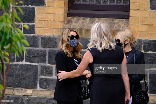 MELBOURNE, AUSTRALIA - MARCH 10: Dannii Minogue and Kylie Minogue attend the memorial service for Australian music promoter Michael Gudinski , on March 10, 2021 in Melbourne, Australia. Australian music promoter and manager Michael Gudinski died aged 68 on March 2. A state memorial service will be held on Wednesday 24 March. (Photo by Luis Ascui/Getty Images)Images)