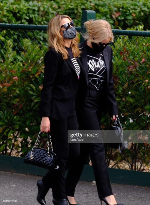 MELBOURNE, AUSTRALIA - MARCH 10: Dannii Minogue and Kylie Minogue attend the memorial service for Australian music promoter Michael Gudinski , on March 10, 2021 in Melbourne, Australia. Australian music promoter and manager Michael Gudinski died aged 68 on March 2. A state memorial service will be held on Wednesday 24 March. (Photo by Luis Ascui/Getty Images)