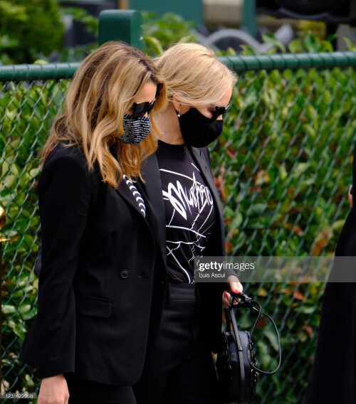 MELBOURNE, AUSTRALIA - MARCH 10: Dannii (left) and Kylie Minogue attend the memorial service for Australian music promoter Michael Gudinski , on March 10, 2021 in Melbourne, Australia. Australian music promoter and manager Michael Gudinski died aged 68 on March 2. A state memorial service will be held on Wednesday 24 March. (Photo by Luis Ascui/Getty Images)