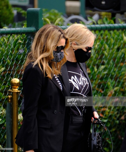 MELBOURNE, AUSTRALIA - MARCH 10: Dannii (left) and Kylie Minogue attend the memorial service for Australian music promoter Michael Gudinski , on March 10, 2021 in Melbourne, Australia. Australian music promoter and manager Michael Gudinski died aged 68 on March 2. A state memorial service will be held on Wednesday 24 March. (Photo by Luis Ascui/Getty Images)
