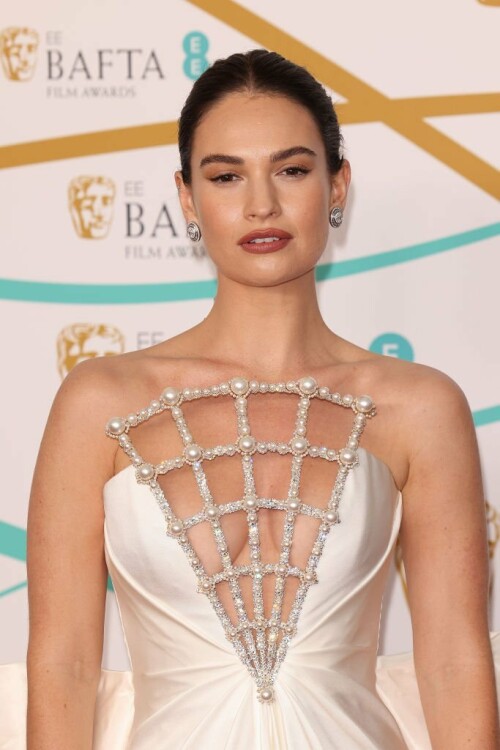 LONDON, ENGLAND - FEBRUARY 19: Lily James attends the EE BAFTA Film Awards 2023 at The Royal Festival Hall on February 19, 2023 in London, England. (Photo by Neil Mockford/FilmMagic)
