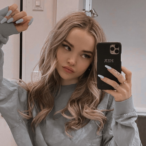 Dove-Cameron-R0795a305fcb2ce6e2fe