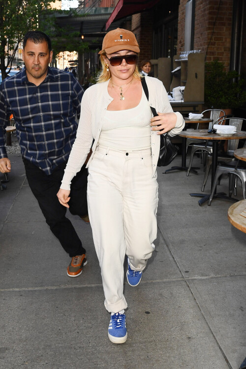 1 May 2025 - EXCLUSIVE.Florence Pugh is spotted out shopping with mystery man in New York City. The British actress wore a brown cap, cardigan sweater, white tank top, matching trousers, and blue Adidas trainers.Credit: GoffPhotos.com   Ref: KGC-339/TIDNY-108**UK Sales Only - No Daily Mail Group/No Sun Group - Exclusive - Newspapers Allrounder - Magazines Double Space Rates - Web/Online Must Call Before Use**