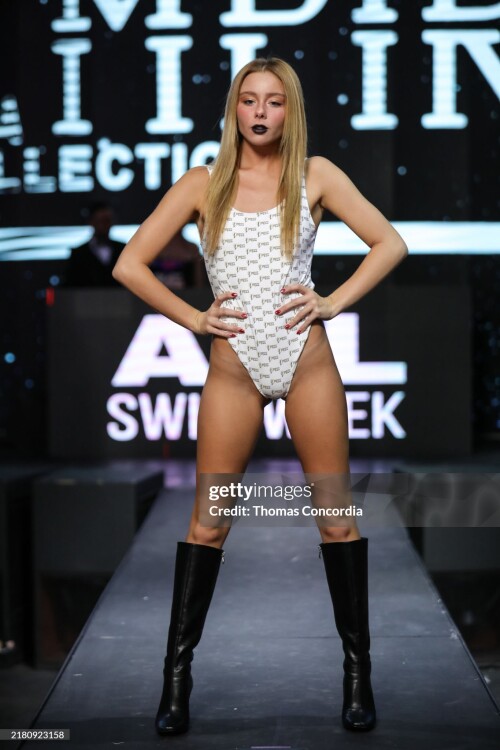 ATLANTA, GEORGIA - OCTOBER 24: A model walks the runway wearing Empire during the ?Midnight Masquerade? Presented By Atlanta Swim Week Runway Show at Domaine on October 24, 2024 in Atlanta, Georgia. (Photo by Thomas Concordia/Getty Images for Atlanta Swim Week)