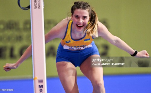 Winner Ukraine's Yaroslava Mahuchikh celebrates after victory in the women's high jump final during The World Athletics Indoor Championships 2022 at the Stark Arena, in Belgrade, on March 19, 2022. (Photo by ANDREJ ISAKOVIC / AFP) (Photo by ANDREJ ISAKOVIC/AFP via Getty Images)