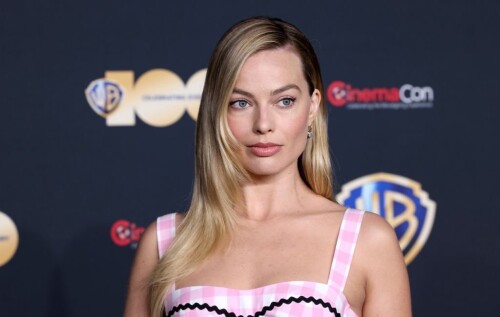 LAS VEGAS, NEVADA - APRIL 25:  Margot Robbie poses for photos as she promotes the upcoming film "Barbie" at the State of the Industry and Warner Bros. Pictures Presentation at The Colosseum at Caesars Palace during CinemaCon, the official convention of the National Association of Theatre Owners, on April 25, 2023, in Las Vegas, Nevada. (Photo by Gabe Ginsberg/Getty Images)