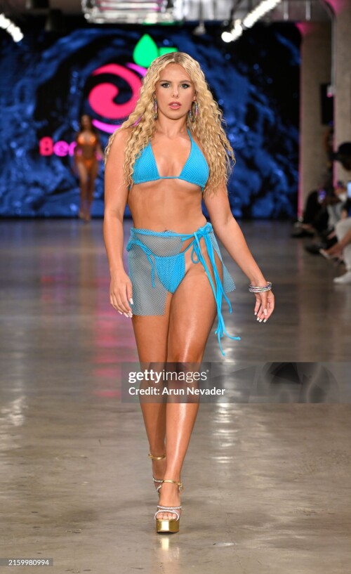LOS ANGELES, CALIFORNIA - JUNE 29: A model walks the runway for Berry Beach at LA Swim Week 2024 powered by Art Hearts Fashion at The New Mart on June 29, 2024 in Los Angeles, California. (Photo by Arun Nevader/Getty Images for Art Hearts Fashion)