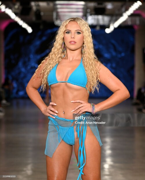 LOS ANGELES, CALIFORNIA - JUNE 29: A model walks the runway for Berry Beach at LA Swim Week 2024 powered by Art Hearts Fashion at The New Mart on June 29, 2024 in Los Angeles, California. (Photo by Arun Nevader/Getty Images for Art Hearts Fashion)
