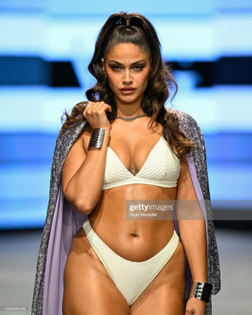 MIAMI BEACH, FLORIDA - JULY 07: A model walks the runway wearing Willfredo Gerardo during Miami Swim Week Powered by Art Hearts Fashion at Fontainebleau Hotel on July 07, 2023 in Miami Beach, Florida. (Photo by Arun Nevader/Getty Images for Art Hearts Fashion)
