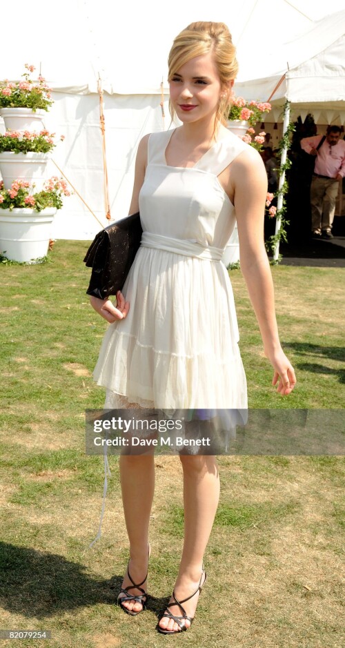 WINDSOR, UNITED KINGDOM - JULY 27:  (EMBARGOED FOR PUBLICATION IN UK TABLOID NEWSPAPERS UNTIL 48 HOURS AFTER CREATE DATE AND TIME)  Emma Watson attends the annual Cartier International Polo Day, at the Cartier Marquee in Great Windsor Park on July 27, 2008 in Windsor, England.  (Photo by Dave M. Benett/Getty Images)