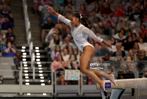 FORT WORTH, TEXAS - JUNE 02: Jordan Chiles falls off the balance beam during the 2024 Xfinity U.S. Gymnastics Championships at Dickies Arena on June 02, 2024 in Fort Worth, Texas. (Photo by Elsa/Getty Images)