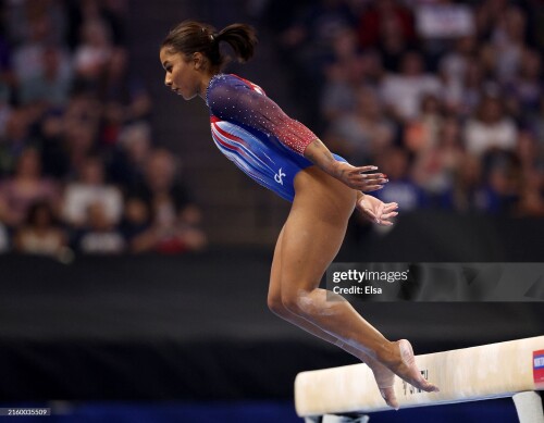 MINNEAPOLIS, MINNESOTA - JUNE 30:  Jordan Chiles falls off the balance beam on Day Four of the 2024 U.S. Olympic Team Gymnastics Trials at Target Center on June 30, 2024 in Minneapolis, Minnesota. (Photo by Elsa/Getty Images)