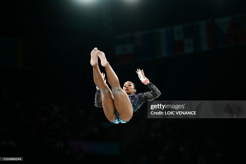 US' Jordan Chiles competes in the uneven bars event of the artistic gymnastics women's qualification during the Paris 2024 Olympic Games at the Bercy Arena in Paris, on July 28, 2024. (Photo by Loic VENANCE / AFP) (Photo by LOIC VENANCE/AFP via Getty Images)