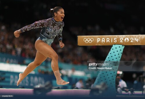 PARIS, FRANCE - JULY 28: Jordan Chiles of Team United States reacts after finishing her routine on the balance beam during the Artistic Gymnastics Women's Qualification on day two of the Olympic Games Paris 2024 at Bercy Arena on July 28, 2024 in Paris, France. (Photo by Naomi Baker/Getty Images)