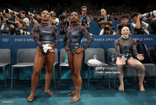 PARIS, FRANCE - JULY 28: (L-R) Jordan Chiles, Simone Biles and Jade Carey of Team United States look on following Biles' vault routine during the Artistic Gymnastics Women's Qualification on day two of the Olympic Games Paris 2024 at Bercy Arena on July 28, 2024 in Paris, France. (Photo by Jamie Squire/Getty Images)