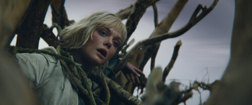 Thia (Elle Fanning) in 20th Century Studios' PREDATOR: BADLANDS film. Photo courtesy of 20th Century Studios.  2025 20th Century Studios. All Rights Reserved.