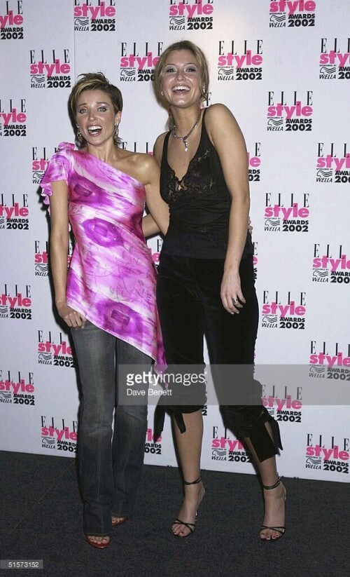 LONDON - SEPTEMBER 16:  Danni Minogue and Holly Valance attend the 2002 Elle Style Awards at The Natural History Museum on September 16, 2002 in London. (Photo by Dave Benett/Getty Images) *** Local Caption *** Danni Minogue;Holly Valance