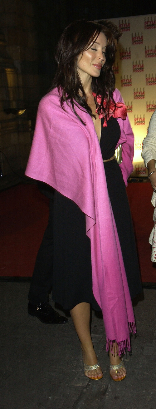 LONDON - FEBRUARY 16: Pop Star Danni Minogue leaves the afterparty following the "Elle Style Awards 2004" at The Natural History Museum on February 16, 2004 in London. (Photo by David Westing/Getty Images) *** Local Caption *** XXX