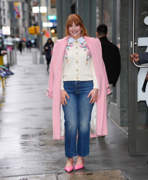 04/07/2025 Bryce Dallas Howard is pictured at ABC studios in New York City. The 44 year old American actress wore a white floral sweater under a long pink coat paired with denim jeans and pink heels. Bryce was later spotted in a black top paired with a tan pattern skirtsales@theimagedirect.com Please byline:TheImageDirect.com