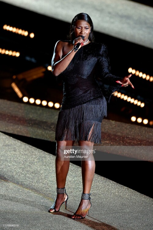 PARIS, FRANCE - SEPTEMBER 24: Aya Nakamura performs during the Etam Winter 2019/Summer 2020 show as part of Paris Fashion Week At Roland Garros on September 24, 2019 in Paris, France. (Photo by Aurelien Meunier/Getty Images)