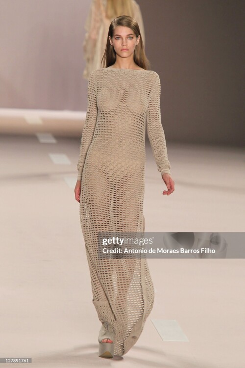 PARIS, FRANCE - OCTOBER 02: A model walks the runway during the Akris Ready to Wear Spring / Summer 2012 show during Paris Fashion Week at Palais de Chaillot on October 2, 2011 in Paris, France. (Photo by Antonio de Moraes Barros Filho/WireImage)