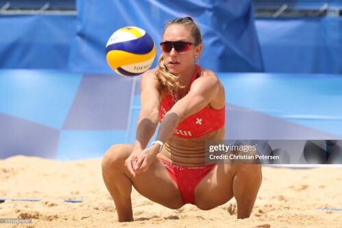 TOKYO, JAPAN - JULY 28: Nina Betschart #2 of Team Switzerland returns the ball against Team Japan during the Women's Preliminary Round - Pool F beach volleyball on day five of the Tokyo 2020 Olympic Games at Shiokaze Park on July 28, 2021 in Tokyo, Japan. (Photo by Christian Petersen/Getty Images)