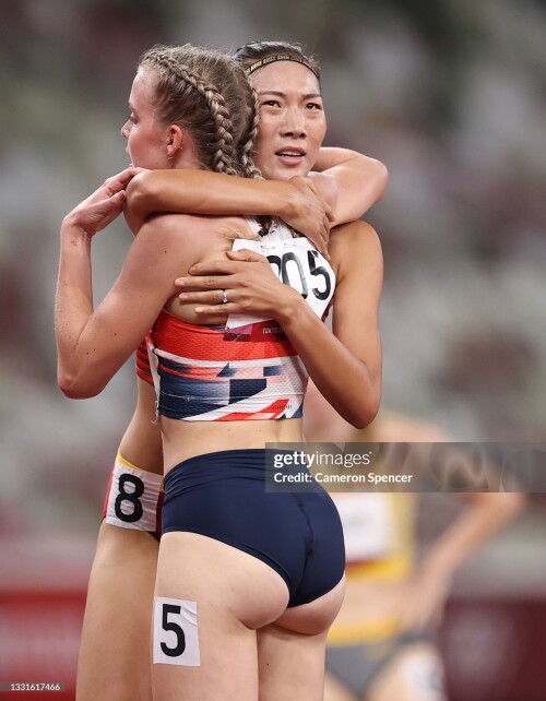 TOKYO, JAPAN - JULY 31: Chunyu Wang of Team China hugs Keely Hodgkinson of Team Great Britain after competing in the Women's 800m Semi-Final on day eight of the Tokyo 2020 Olympic Games at Olympic Stadium on July 31, 2021 in Tokyo, Japan. (Photo by Cameron Spencer/Getty Images)