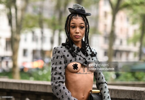 NEW YORK, NEW YORK - SEPTEMBER 09: Coi Leray is seen wearing a black and white Moschino outfit outside the Moschino show during New York Fashion Week S/S 22 on September 09, 2021 in New York City. (Photo by Daniel Zuchnik/Getty Images)