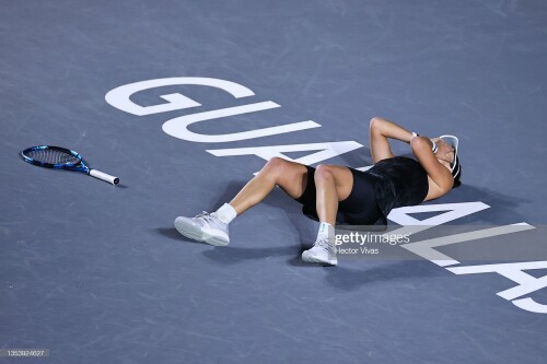 GUADALAJARA, MEXICO - NOVEMBER 17: Garbi?e Muguruza of Spain celebrates after match point in Women's Singles final match against Anett Kontaveit of Estonia during Day 8 of 2021 Akron WTA Finals Guadalajara at Centro Panamericano de Tenis on November 17, 2021 in Guadalajara, Mexico. (Photo by Hector Vivas/Getty Images for WTA,)