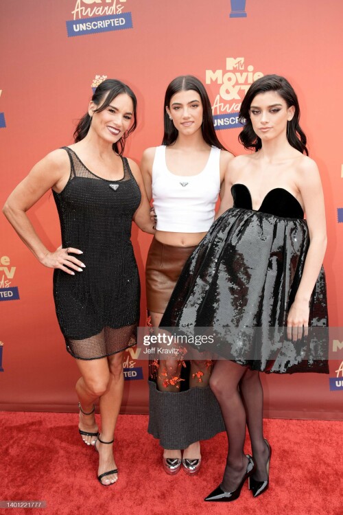 SANTA MONICA, CALIFORNIA: In this image released on June 5, (L-R) Heidi D'Amelio, Charli D?Amelio and Dixie D?amelio attend the 2022 MTV Movie & TV Awards: UNSCRIPTED at Barker Hangar in Santa Monica, California and broadcast on June 5, 2022. (Photo by Jeff Kravitz/Getty Images for MTV)