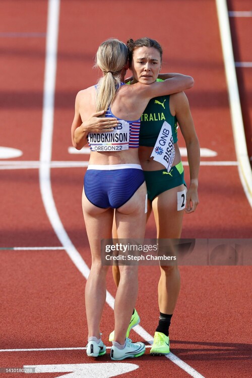 EUGENE, OREGON - JULY 21: Keely Hodgkinson of Team Great Britain and Catriona Bisset of Team Australia embrace following a Women's 800m heat on day seven of the World Athletics Championships Oregon22 at Hayward Field on July 21, 2022 in Eugene, Oregon. (Photo by Steph Chambers/Getty Images)