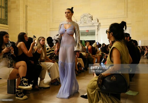 NEW YORK, NEW YORK - SEPTEMBER 12: (EDITORS NOTE: Image contains nudity.) A model walks the runway at the Kim Shui fashion show during September 2022 New York Fashion Week: The Shows at Vanderbilt Hall at Grand Central Terminal on September 12, 2022 in New York City. (Photo by Theo Wargo/Getty Images for NYFW: The Shows)